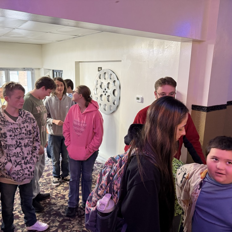 students at movie theatre 