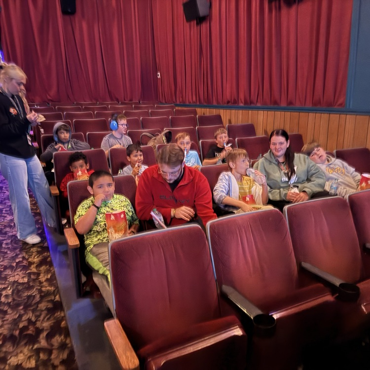 students at movie theatre 