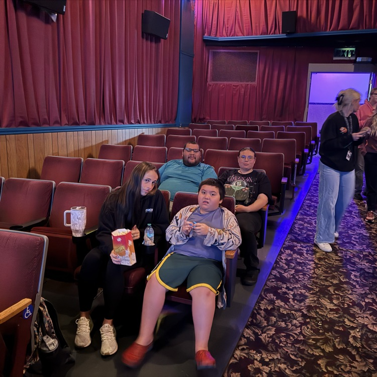 students at movie theatre 