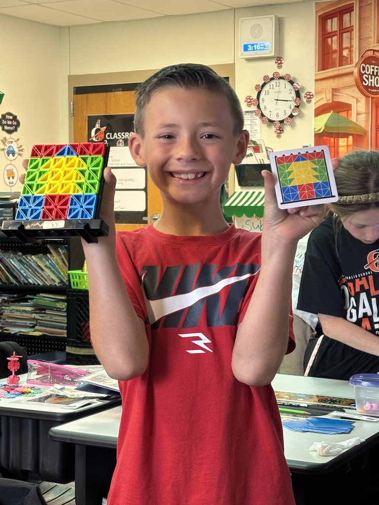 students building with math STEM bins