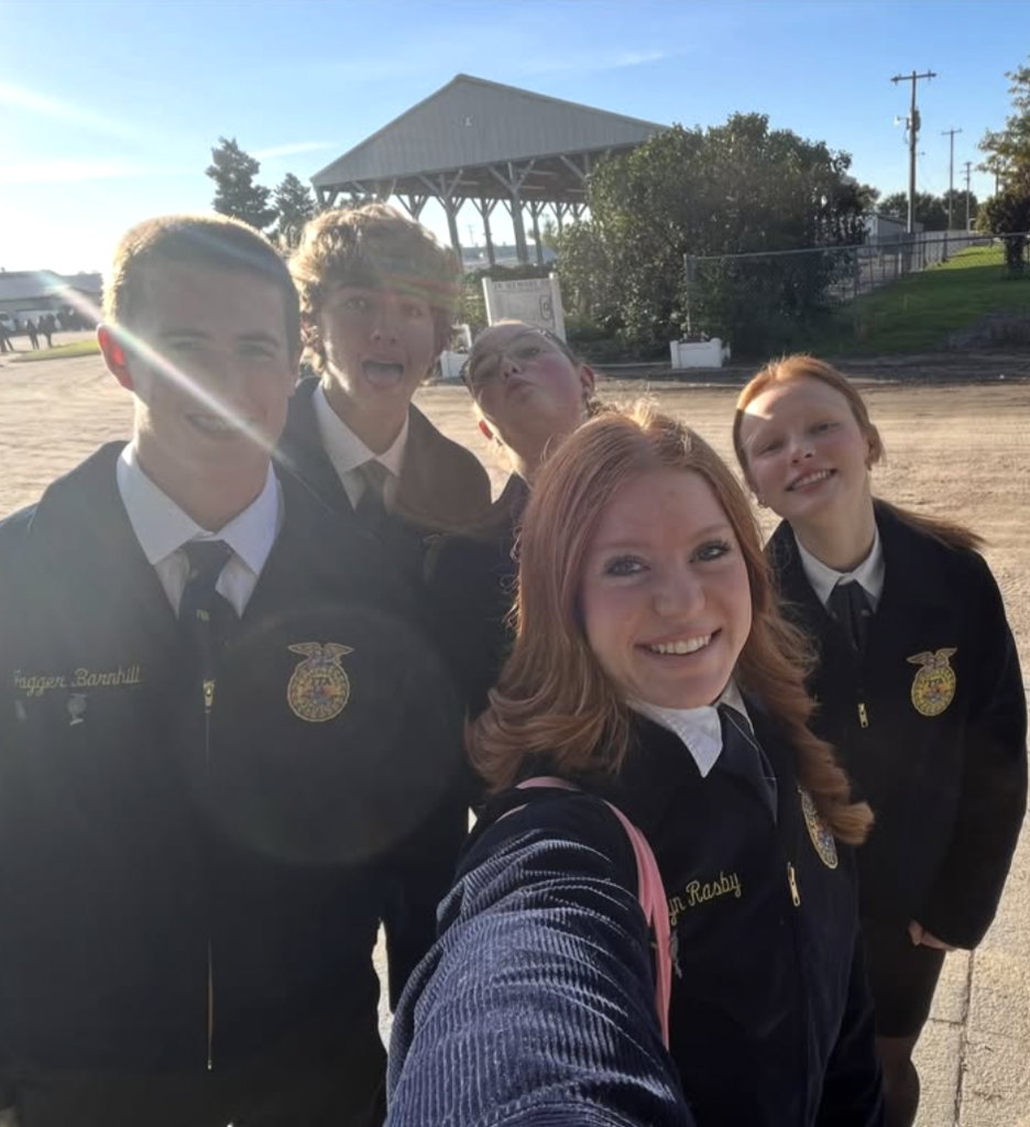 selfie of 5 ffa members smiling at camera