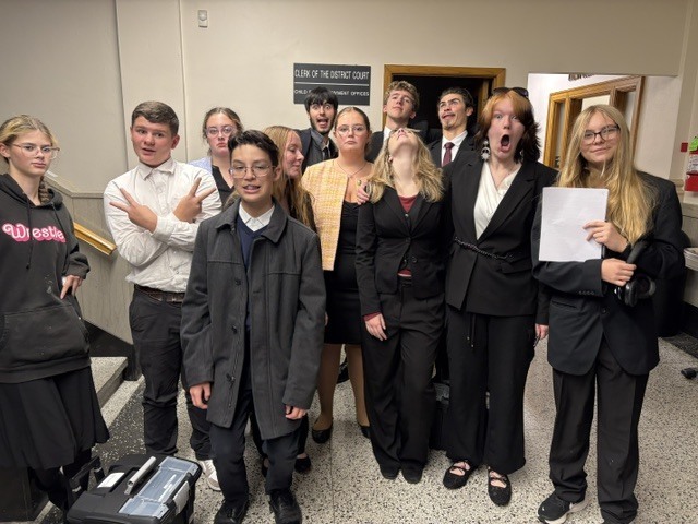 mocktrial team doing a silly team photo