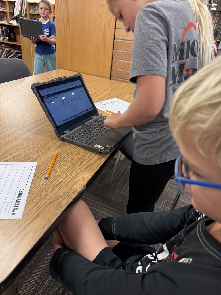 students searching for the card catlog