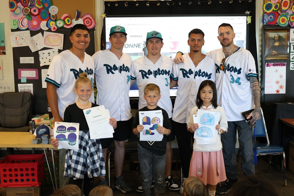 Ogden Raptors players with students