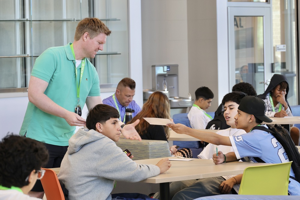OTECH High School Students collaborate in small group sessions while interacting with teachers