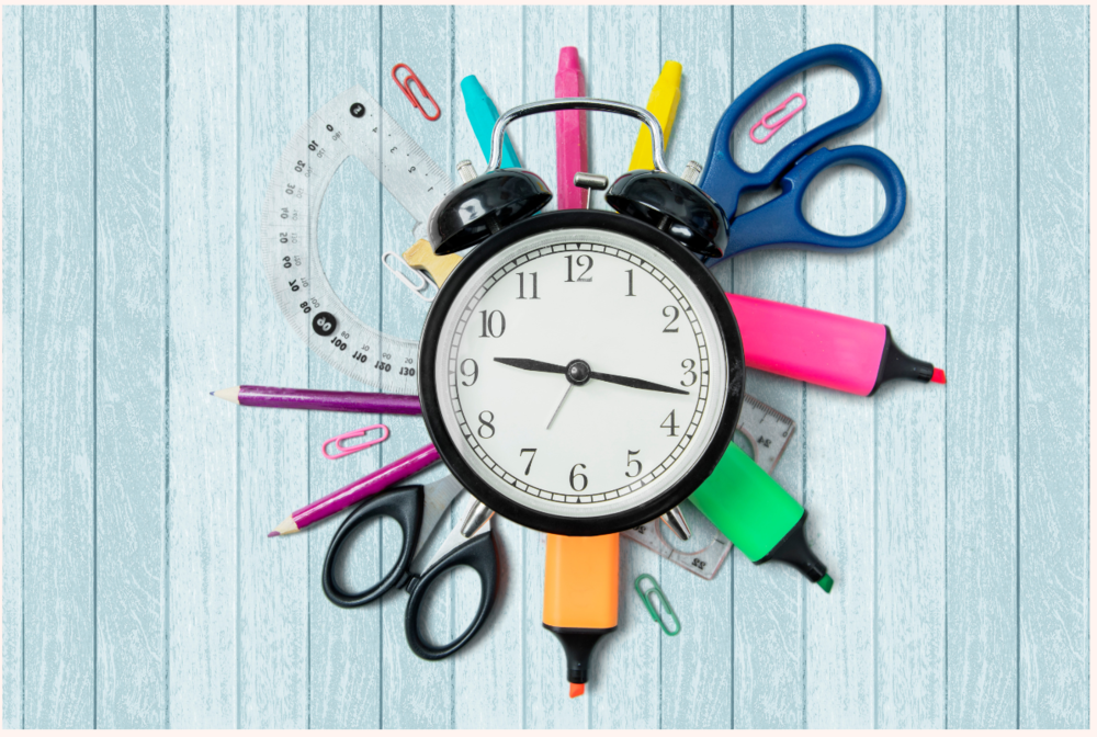 clock with school supplies