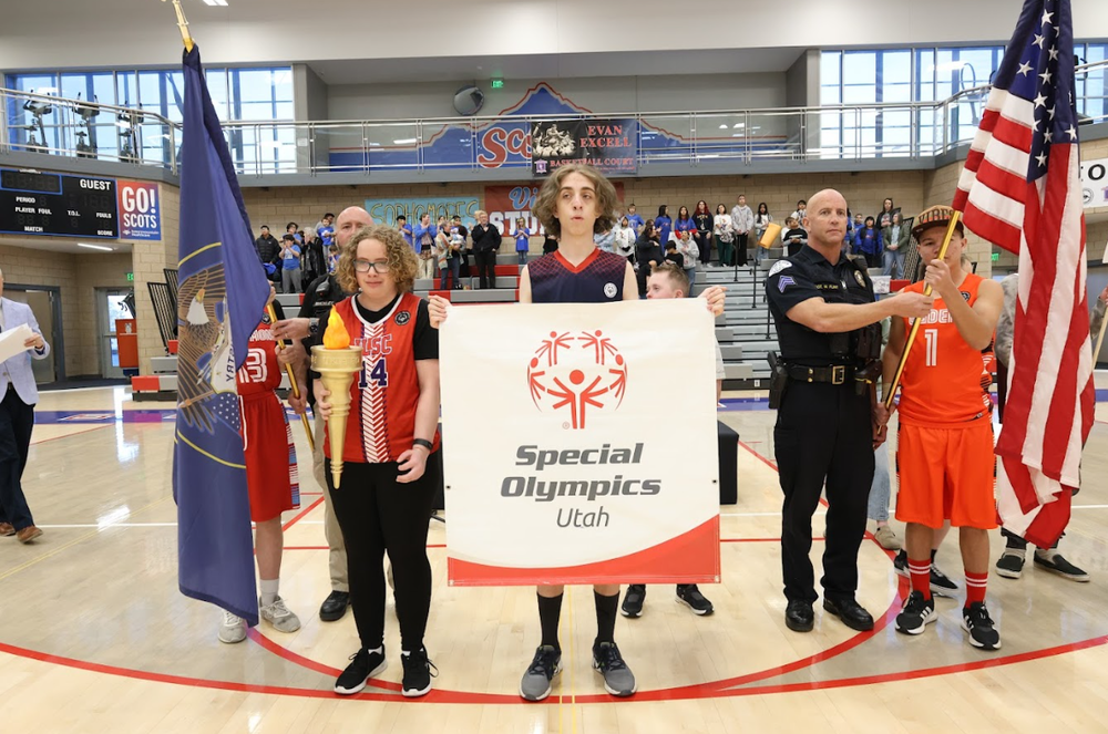 Unified Sports players with banner