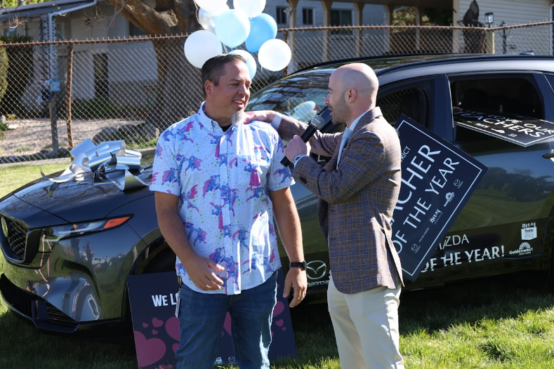 Teacher of the Year with Young Mazda