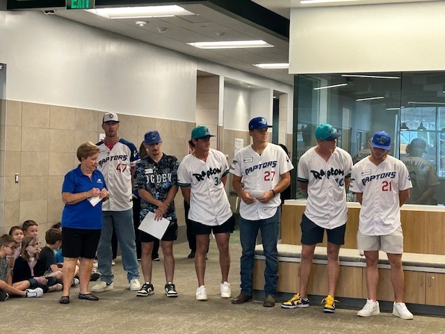 Students with Ogden Raptors Baseball players