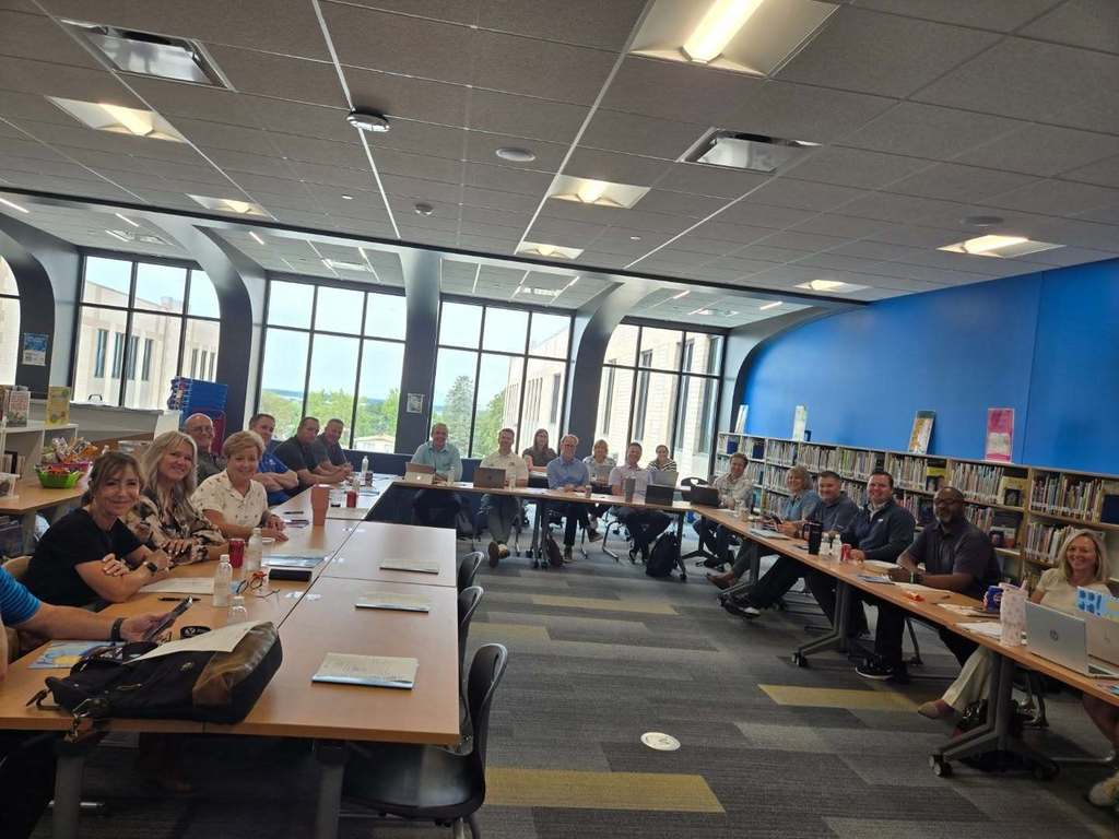 OSF board member sitting at tables
