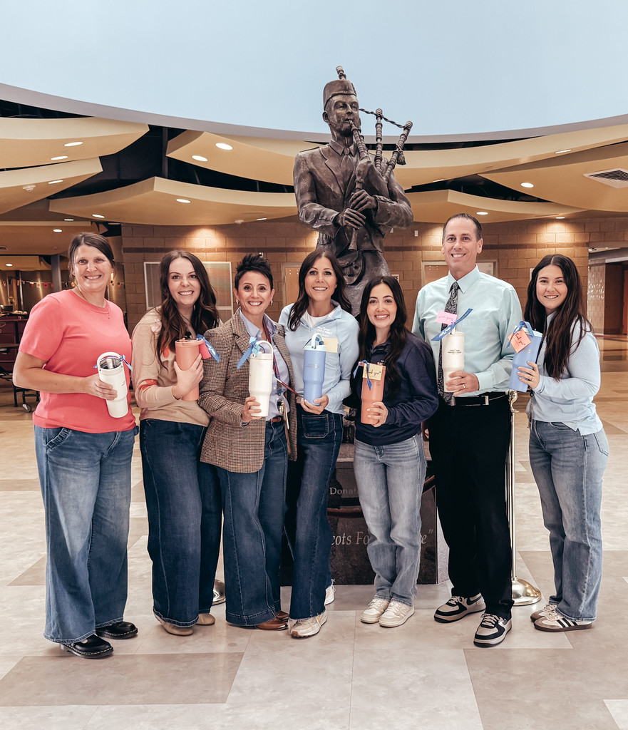 BLHS staff and AFCU reps posing with gifts