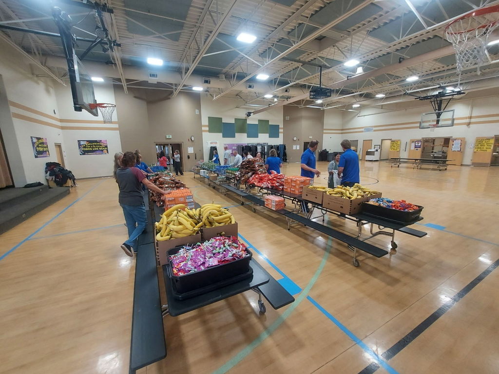 OSF Board members ready to hand out food to students