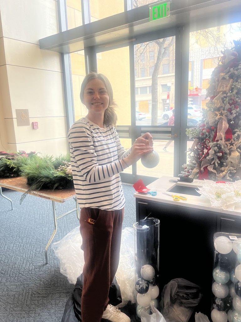 staff decorating tree