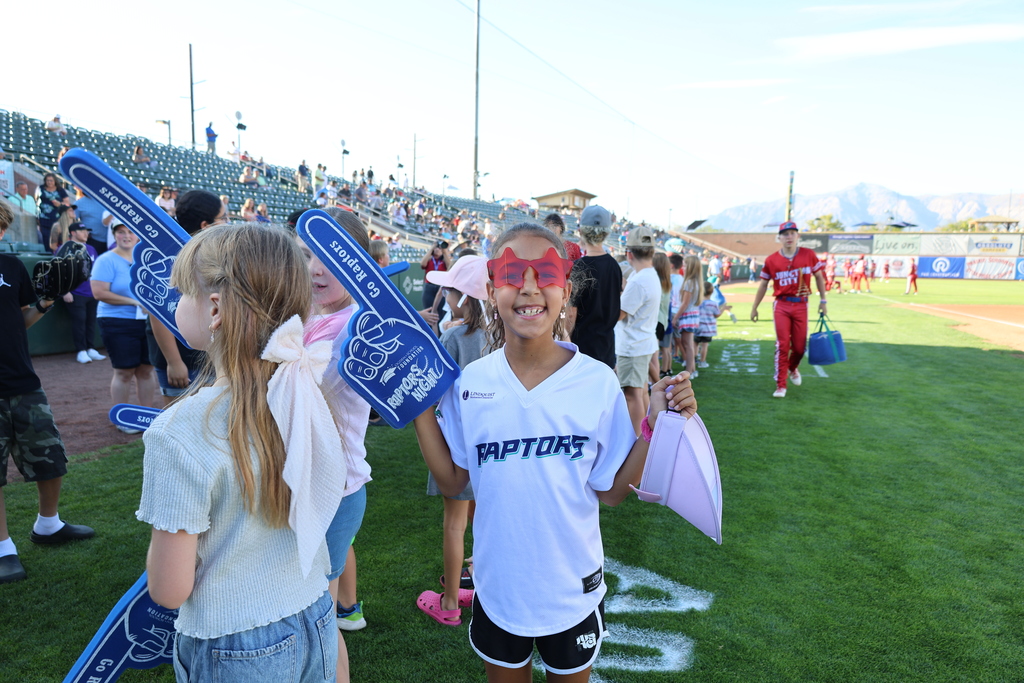 student on Raptors baseball field