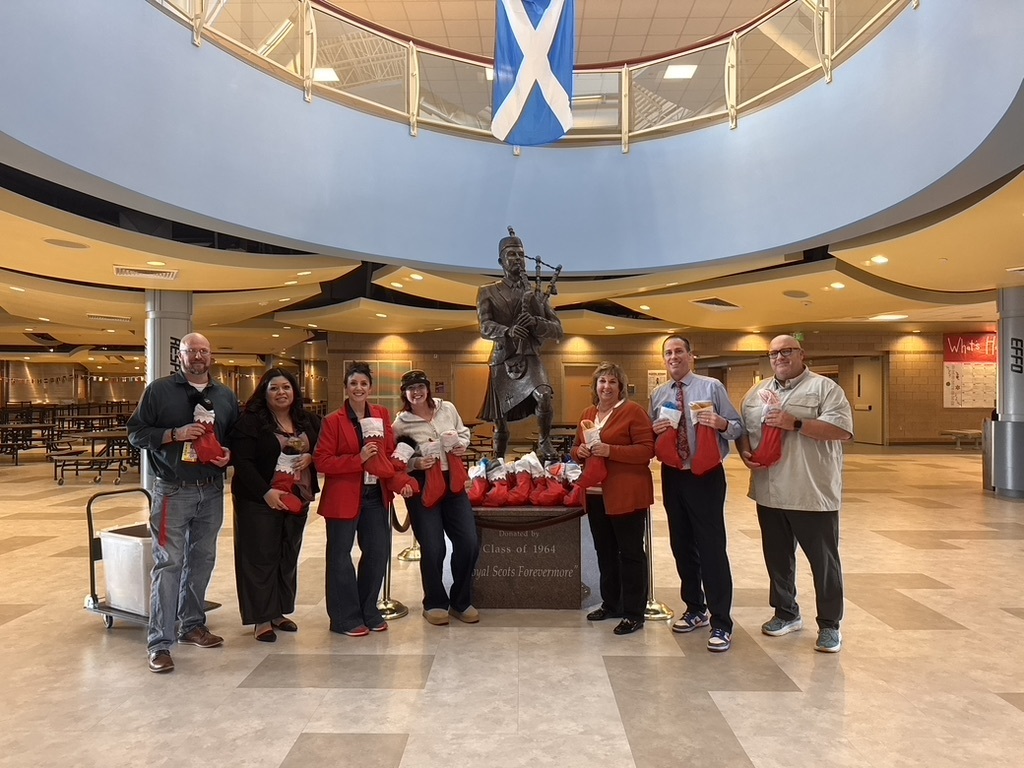 BLHS staff and NWAOR Reps with donated holiday stockings