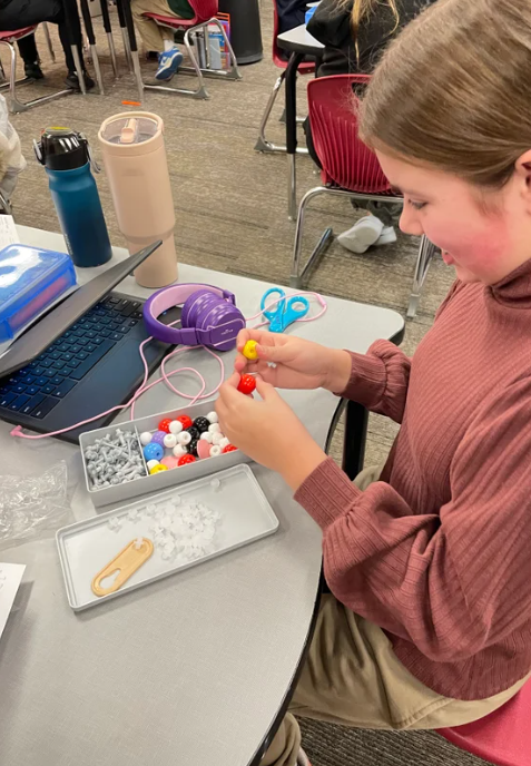 students working with new science supplies