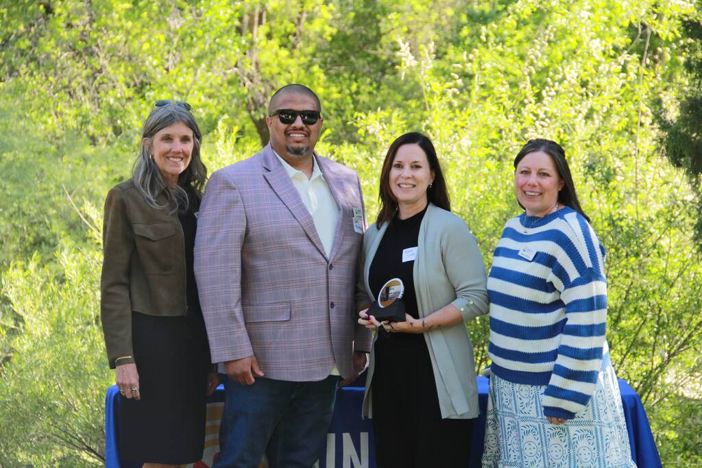 Katie Scott receives the United Way award for her work in the AVID program