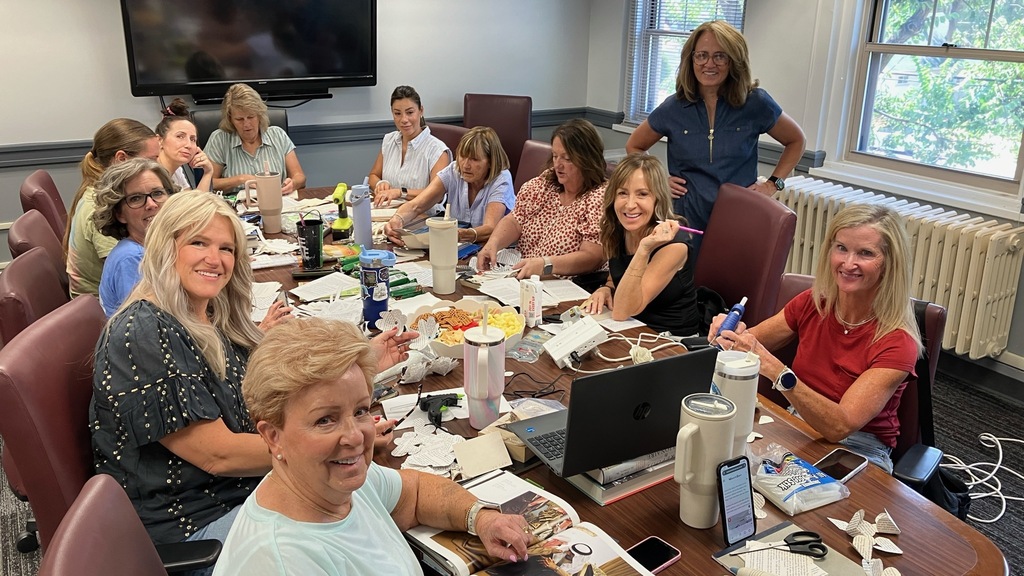 decorating committee working around conference table