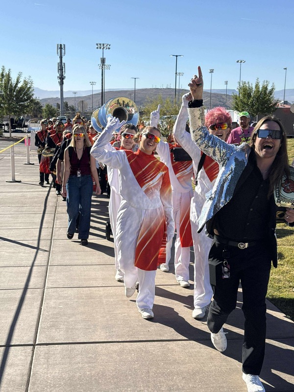 The band leaving the stadium