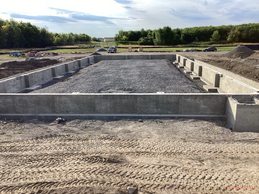 Photo of the foundation of the new transportation facility located at 5952 State Highway 812.