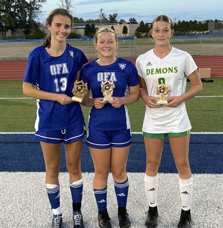 Pictured left to right: Ella Ramsdell (OFA, MVP), Meriam Skamperle (OFA, All Tournament), and Mia Brown (Hermon-DeKalb, All Tournament)