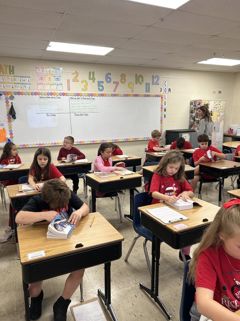Dictionaries presented to third grade students.