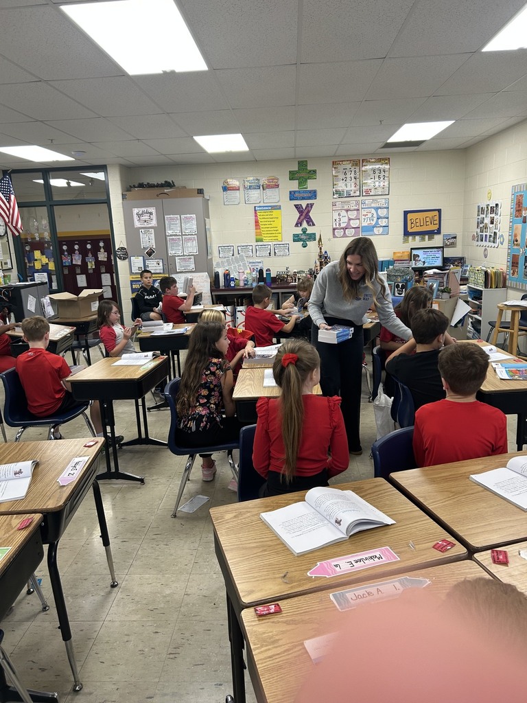 Dictionaries presented to third grade students.