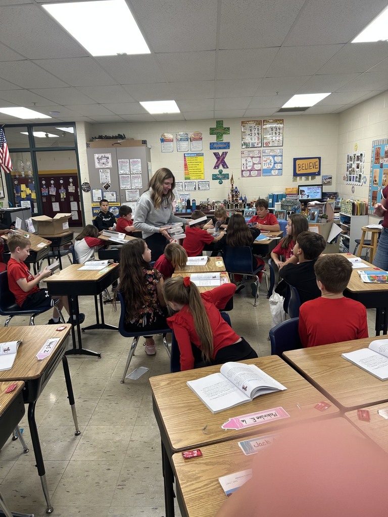 Dictionaries presented to third grade students.