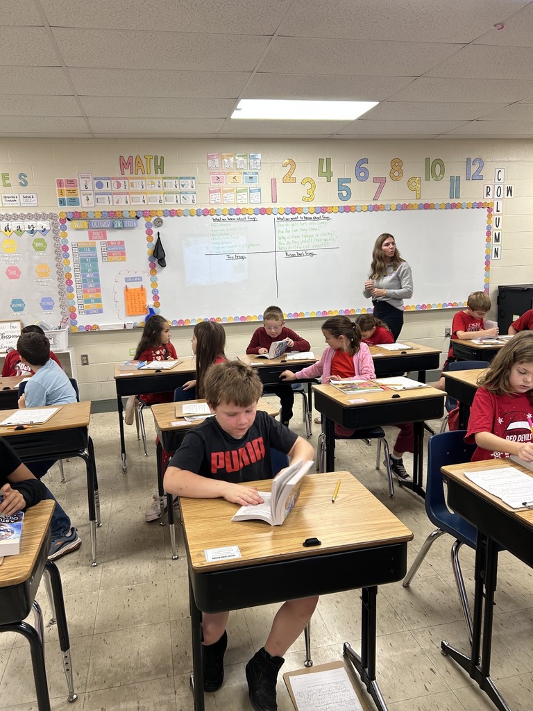 Dictionaries presented to third grade students.
