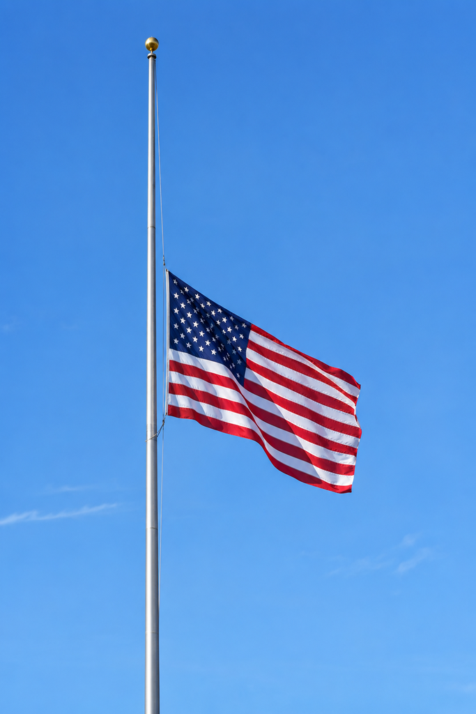 american flag at half staff
