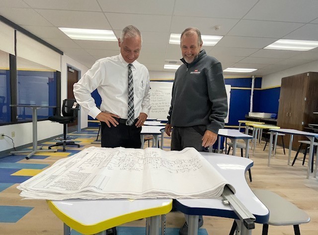 Jeff Prager, at right, is shown with Wheeling Middle School Principal Rich McCardle in the school’s new Makerspace.