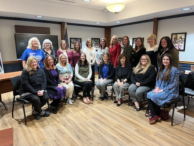 Steenrod staff posing for photo
