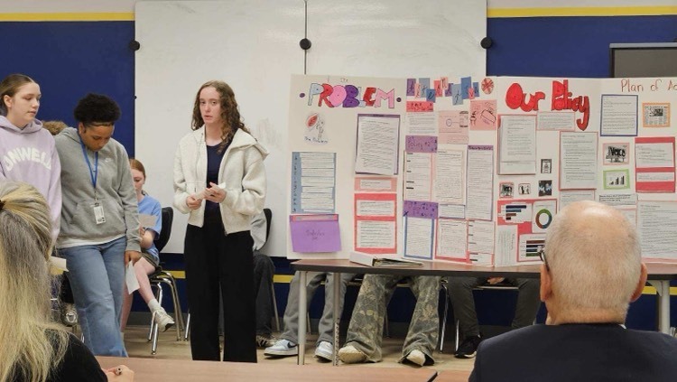 student presenting to group