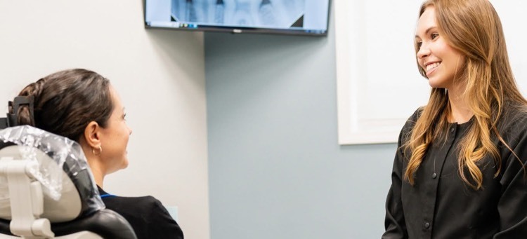 dentist and patient talking