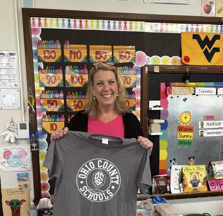 woman posing holding t shirt 