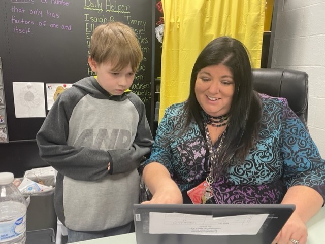 Pictured is West Liberty Elementary School teacher Brandy Lackie working with one of her students.