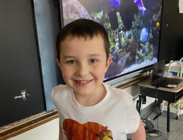 boy posing and smiling