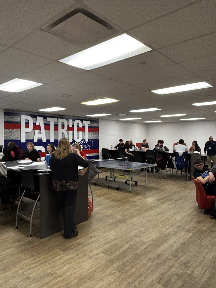 students filling out paperwork