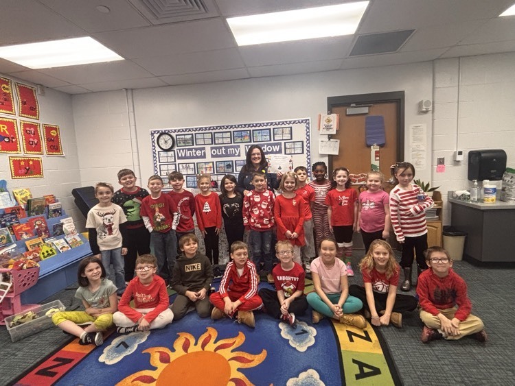 students posing with teacher