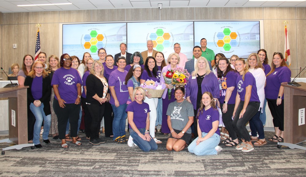 Dr. Kelley at SB meeting with family, friends, District administration, and SB members.