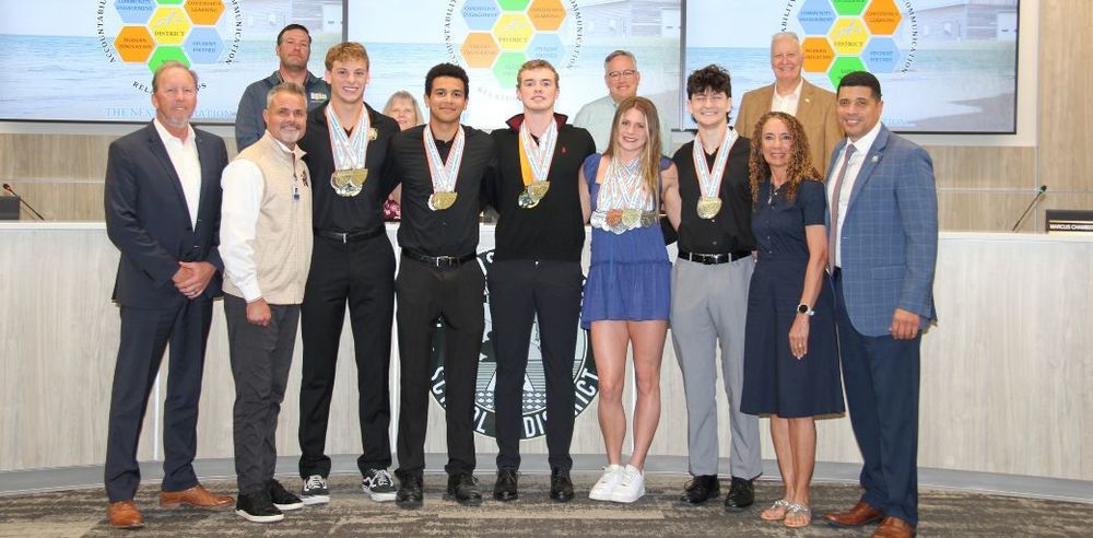 Niceville HS Swim Team members at March 9th School Board meeting.