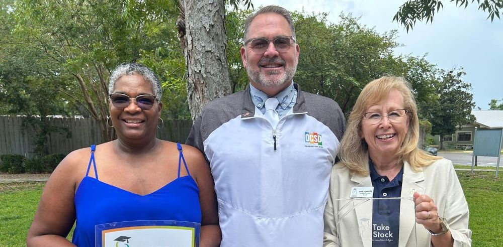 Pictured L to R: Student Services Coordinator Patrice Bobo-Miles, Executive Director John Spolski, and College Readiness Coach Lori Lipnicky