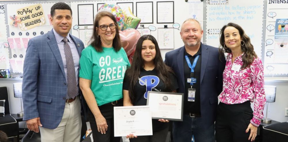 Zeyda Ramos with Superintendent, Teachers, and Principal