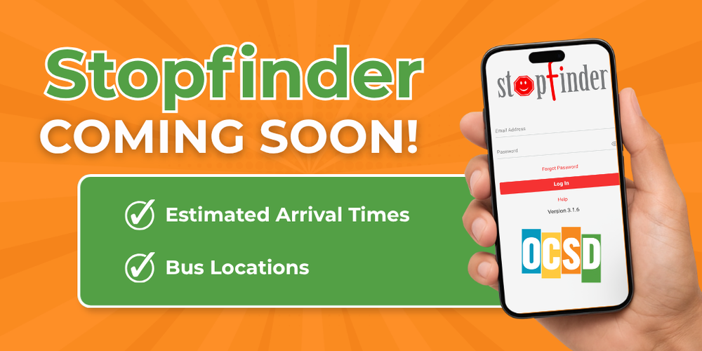 Graphic with an orange background and large text reading “Stopfinder COMING SOON!” On the right, a hand holds a smartphone displaying the Stopfinder app login screen with the OCSD logo. A green box highlights two features with checkmarks: “Estimated Arrival Times” and “Bus Locations.” The graphic announces the upcoming launch of the Stopfinder school bus tracking app for Okaloosa County School District families.