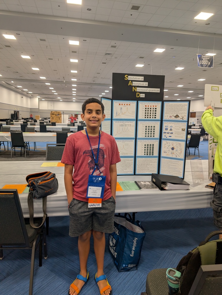 Photo of Ian in front of his winning science project!