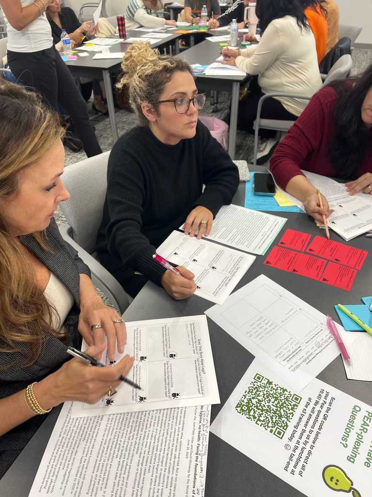 ELA teachers dive into professional learning with S3Strategies in a classroom setting.