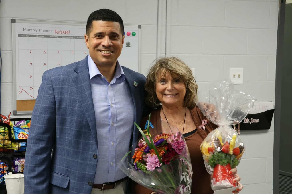 𝐒𝐭𝐚𝐫𝐥𝐚 𝐋𝐮𝐜𝐚𝐬, Bookkeeper at Mary Esther Elementary with Superintendent Chambers