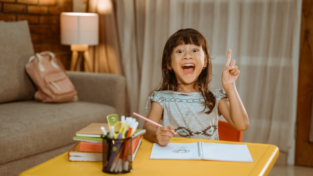 Helping Children Grow Self-Awareness and Self-Management - Little girl doing homework