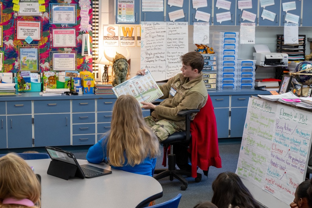 87th EWS Airman reading to class 2