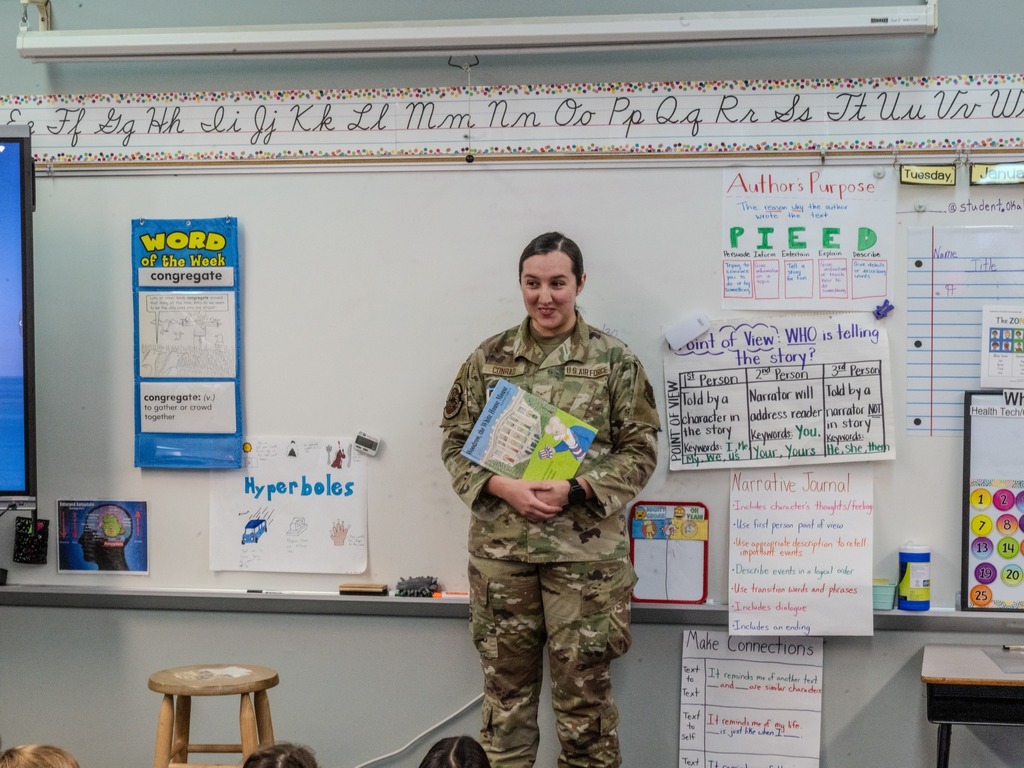 87th EWS Airman reading to class 2